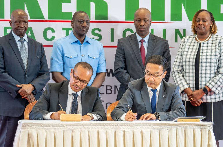 Amsons Group Managing Director Mr Edha Nahdi Left And Sinoma CBMI Chairman Mr Zhang Sicai Signing The US250 Million Matuga Clinker Factory Construction Contract 770x508