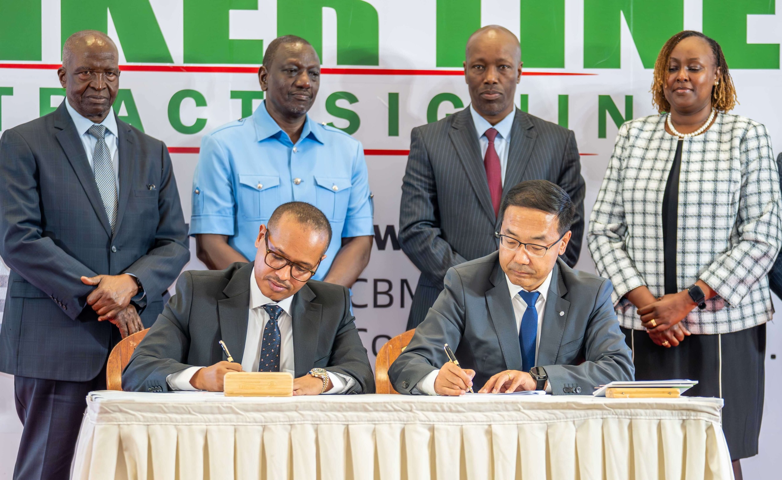 Amsons Group Managing Director Mr Edha Nahdi Left And Sinoma CBMI Chairman Mr Zhang Sicai Signing The US250 Million Matuga Clinker Factory Construction Contract Scaled