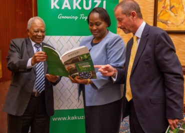 kakuzi chairman nicholas ng'ang'a joins the firms director pamella ager and managing director chris flowers in skimming through the firm's 2025 annual report and financial statements