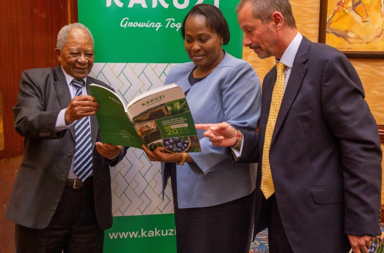 kakuzi chairman nicholas ng'ang'a joins the firms director pamella ager and managing director chris flowers in skimming through the firm's 2025 annual report and financial statements